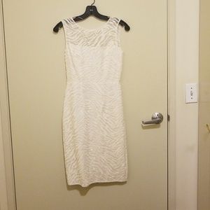 Curve-hugging white midi dress